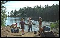 The water taxi leaves Marion, Emily, Ray and Fleur, lots of bags and two canoes in Algonquin Provincial Park, Canada