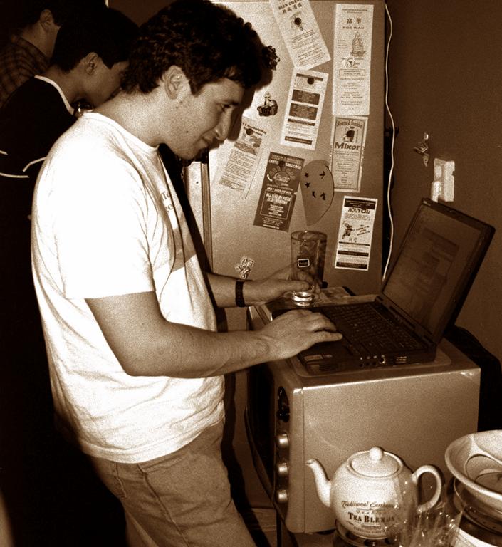 Having had one cocktail too many, Alex attempts to hack into my microwave during my birthday party in 2001