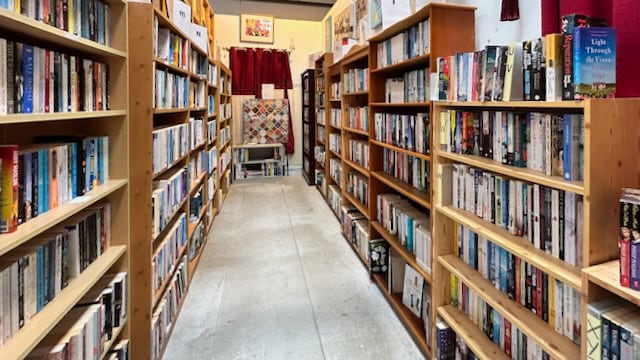 Secondhand books at the Guildcare charity superstore ‘The Greenhouse’, East Worthing, UK
