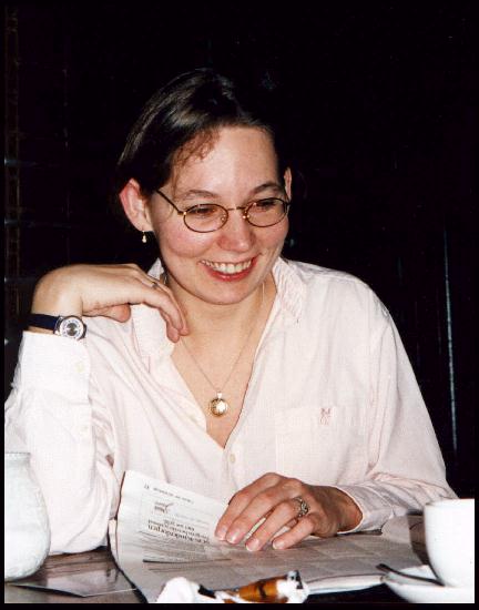 Marion reading the paper (1998)